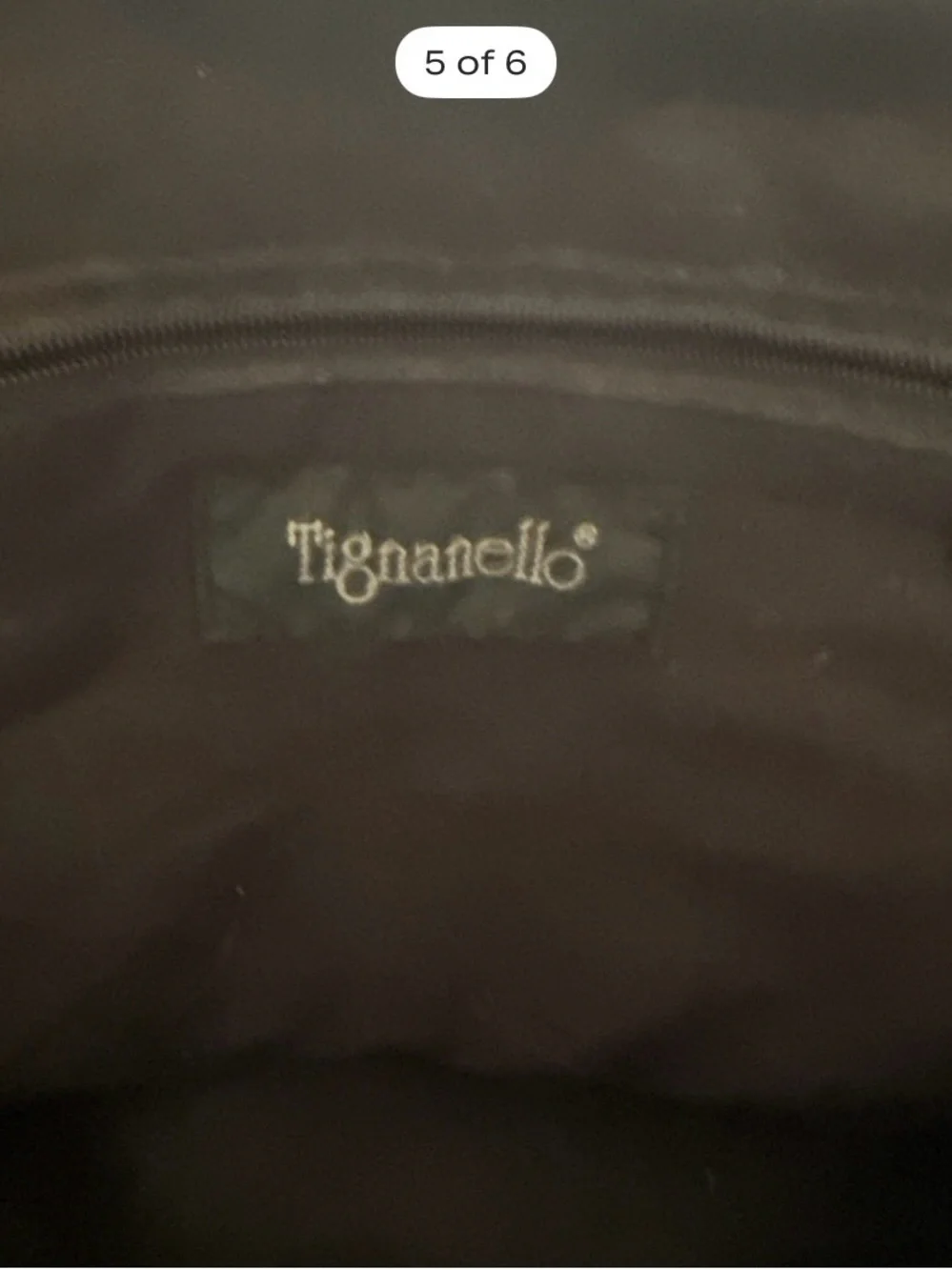 Tignanello black leather sling backpack